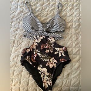 NWOT One piece Swimsuit. Size M. Side cut out